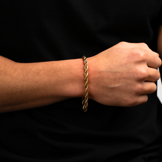 Set Lazo Dorado 18K – Cadena + Pulsera con Presencia y Estilo