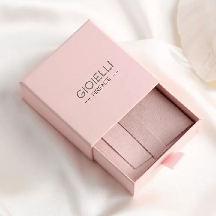 Par de aretes de garra bañados en oro con circonitas